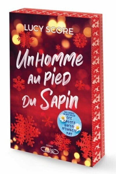 UN HOMME AU PIED DU SAPIN